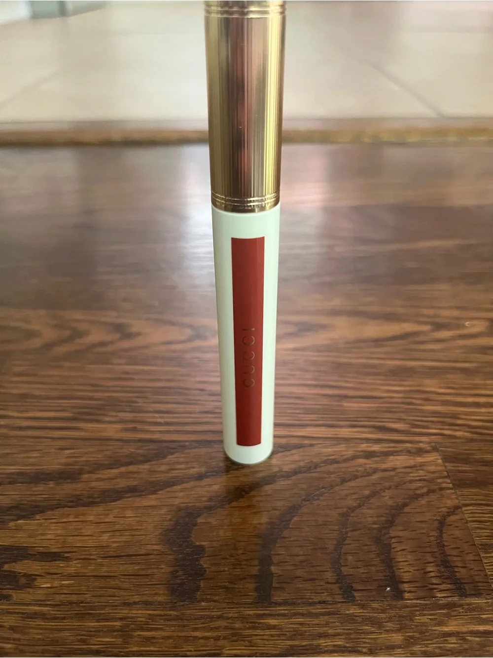 Gucci Oil-In-Water Tint Hydrating Stain in shade 308 “Lucy Dark Orange”